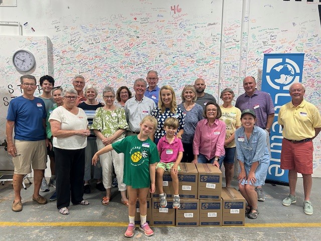 LifelineVolunteers Walnut Hill Church Volunteers in a group at Lifeline Meal Packing center